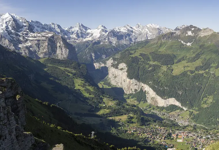Green valley and Alpine mountains in Switzerland